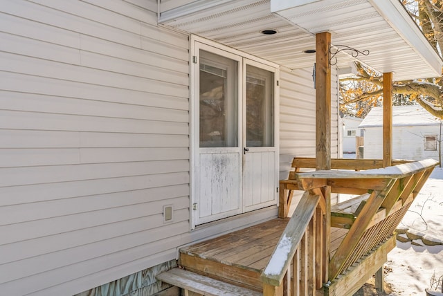 view of snow covered deck