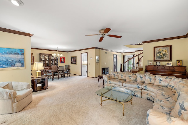 living room with light colored carpet, ornamental molding, and ceiling fan with notable chandelier