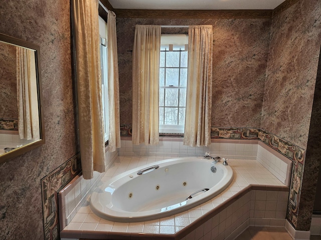 bathroom featuring tiled tub