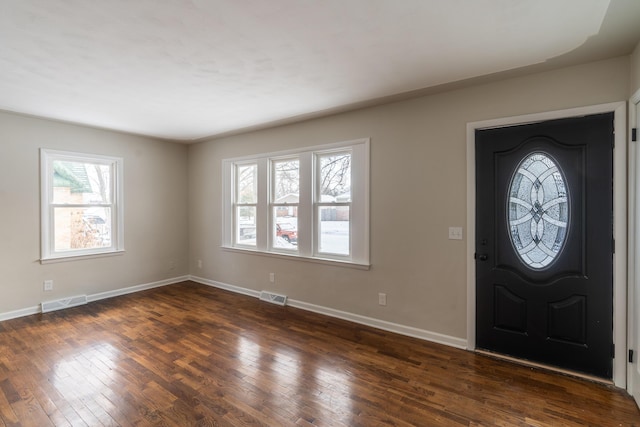 entryway with dark wood-type flooring