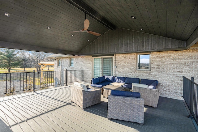 deck with ceiling fan and outdoor lounge area