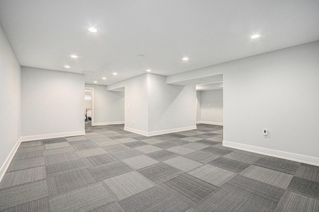 basement featuring carpet flooring