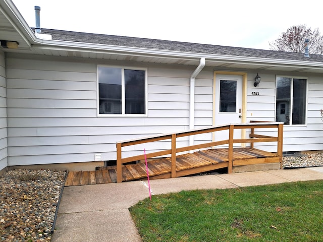 doorway to property with a deck