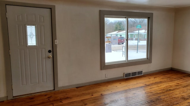 foyer with light hardwood / wood-style flooring