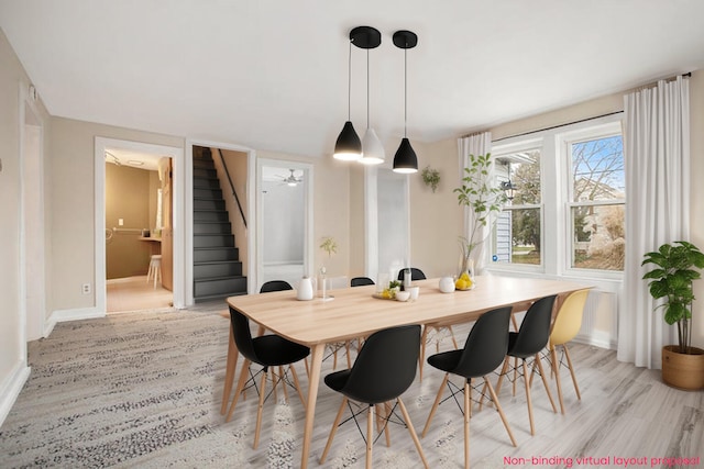 dining room with light hardwood / wood-style floors