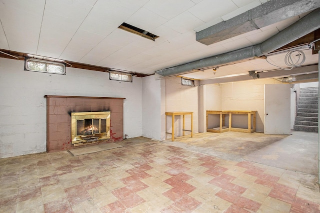 basement with a fireplace