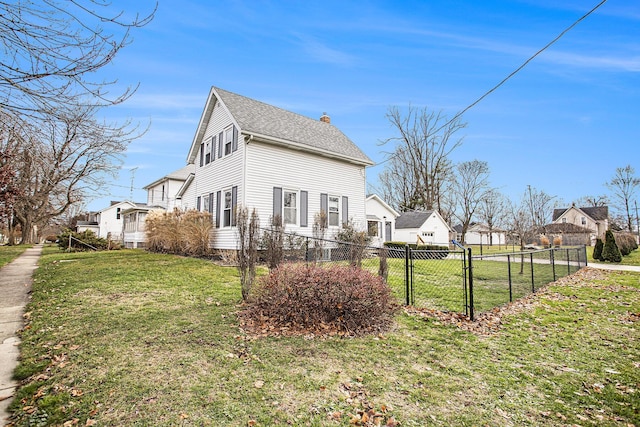 view of home's exterior featuring a yard