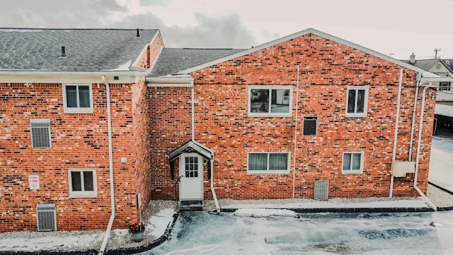 view of snow covered property