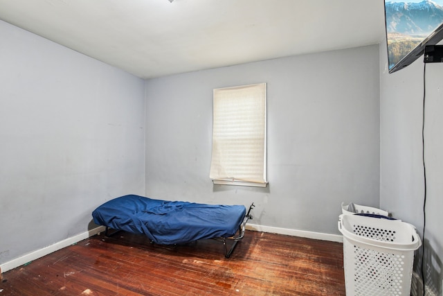 bedroom featuring dark hardwood / wood-style floors