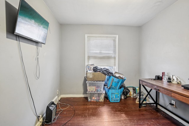 misc room with dark wood-type flooring