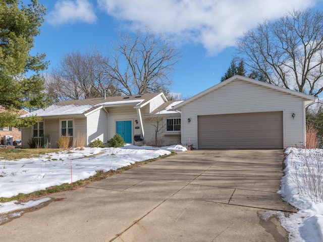 ranch-style home with a garage