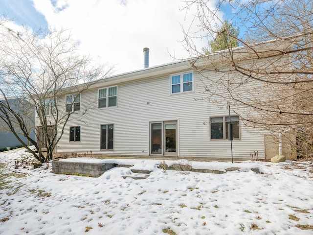 view of snow covered property