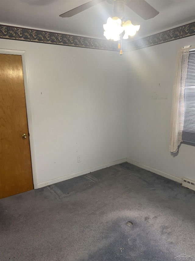 carpeted empty room with ceiling fan