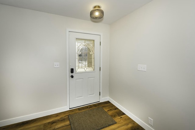 entryway with dark hardwood / wood-style floors