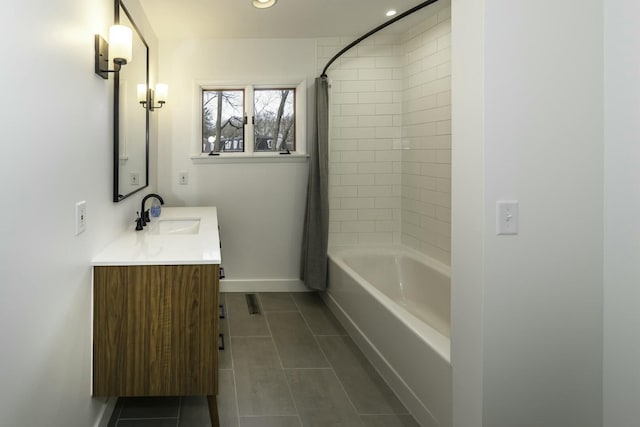 bathroom featuring vanity, tile patterned flooring, and shower / bath combo