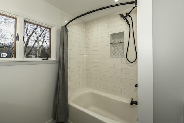 bathroom with shower / tub combo