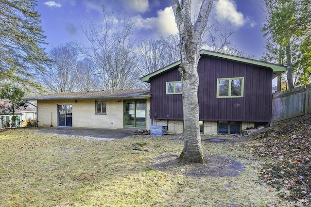 rear view of house featuring a patio area