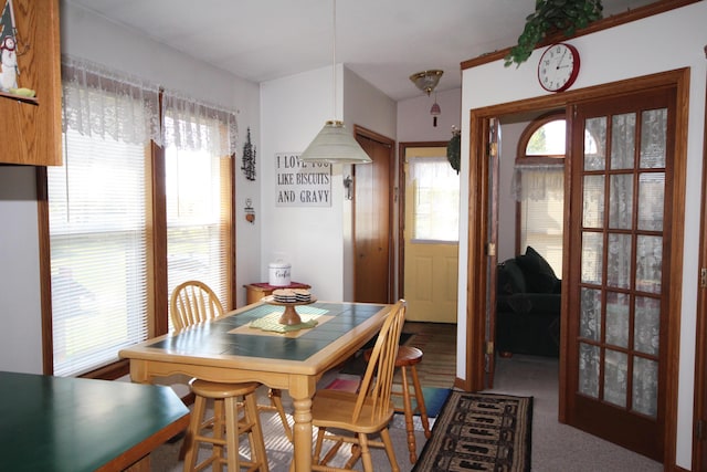 dining area with french doors and plenty of natural light