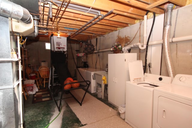 basement with washing machine and clothes dryer