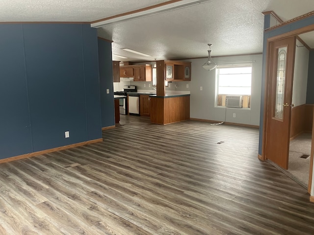 unfurnished living room featuring dark wood-style floors, cooling unit, visible vents, and a textured ceiling