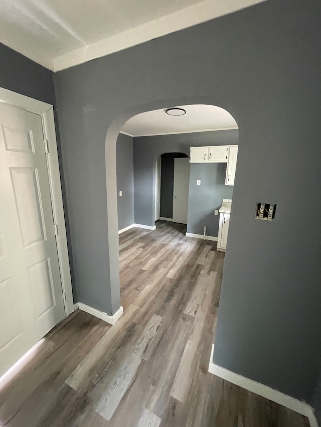 hallway featuring dark hardwood / wood-style flooring