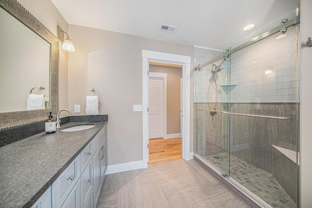 1115 Nature Trl, Manchester, MI 48158 - bathroom featuring a shower with door and vanity