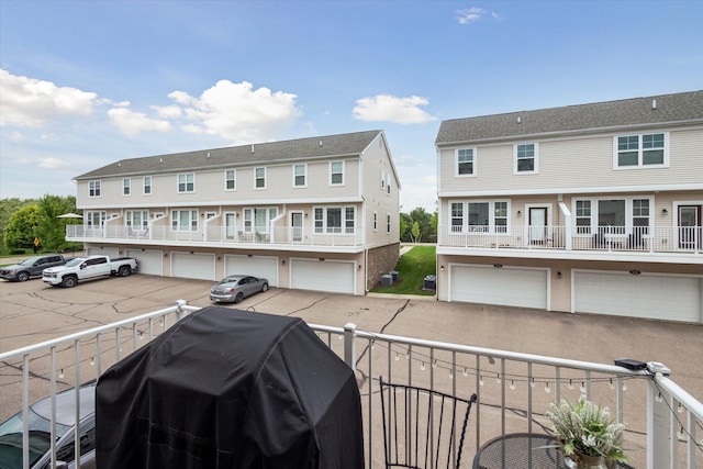 exterior space with a garage and fence