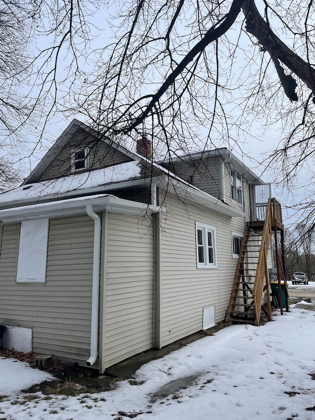 view of snow covered property