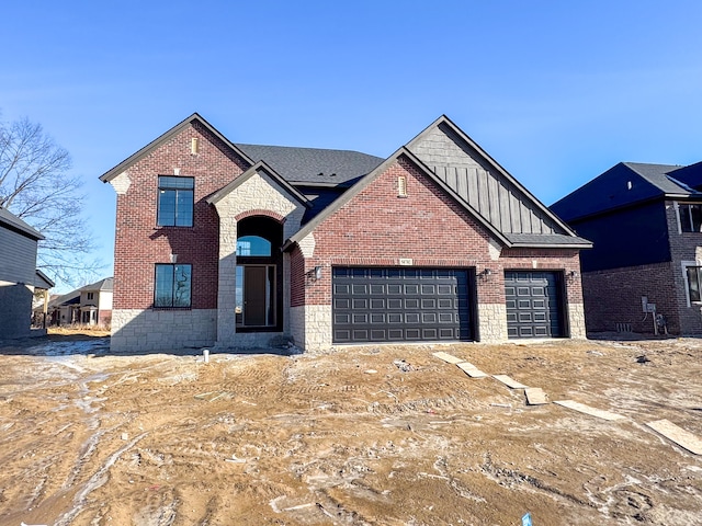 view of front of property with a garage