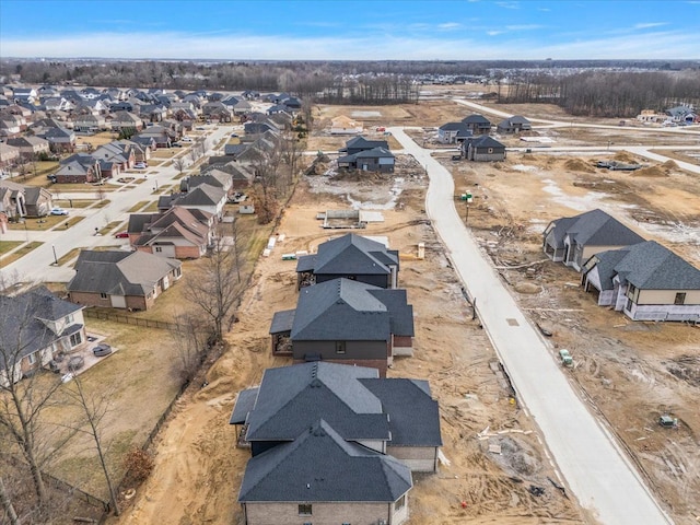 birds eye view of property with a residential view