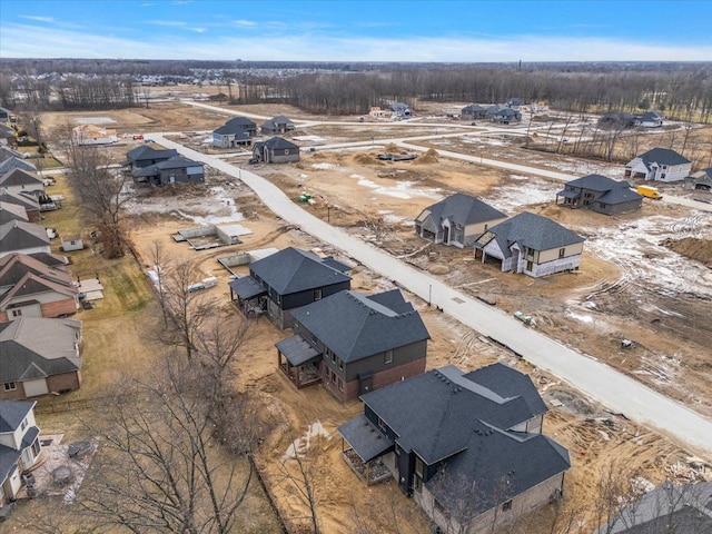 birds eye view of property with a residential view