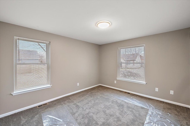 view of carpeted spare room