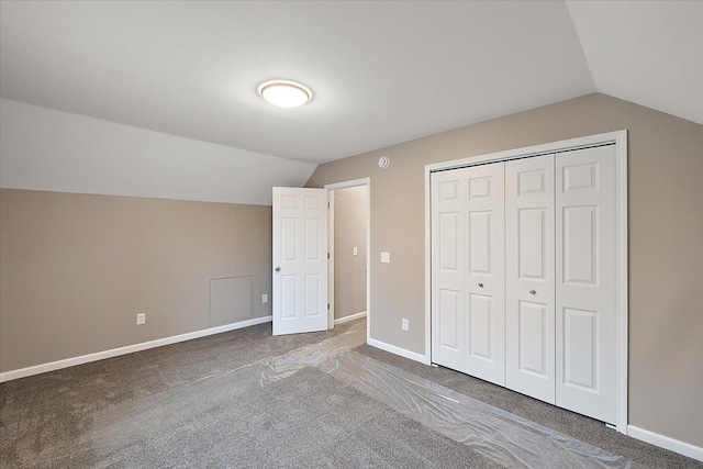 additional living space with lofted ceiling and carpet floors