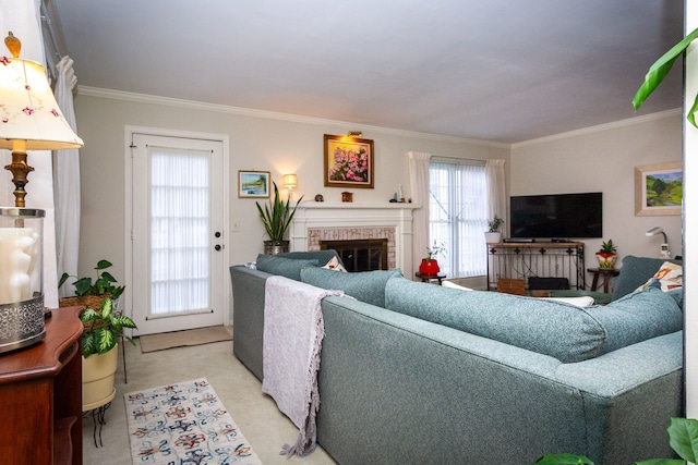 living room featuring light carpet, a brick fireplace, and crown molding