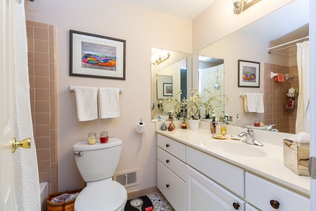 full bathroom with vanity, shower / bathtub combination with curtain, and toilet