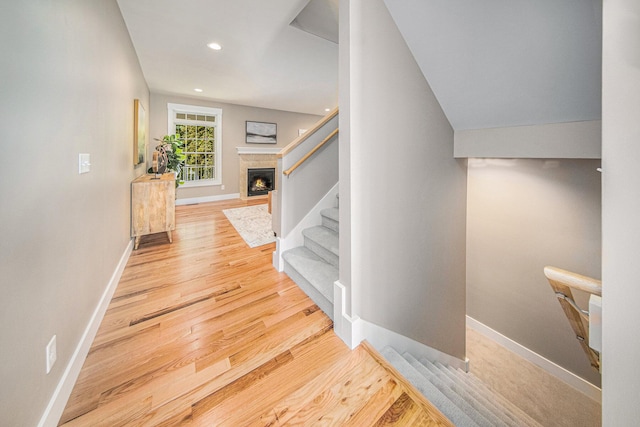 stairway with wood-type flooring