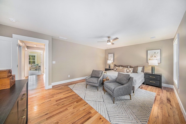 bedroom featuring ceiling fan and light wood-type flooring