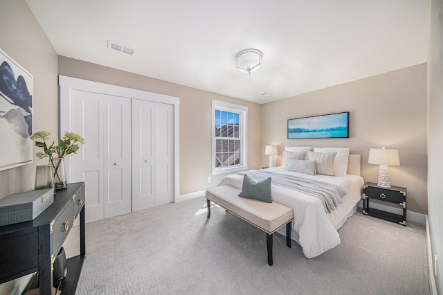 carpeted bedroom featuring a closet