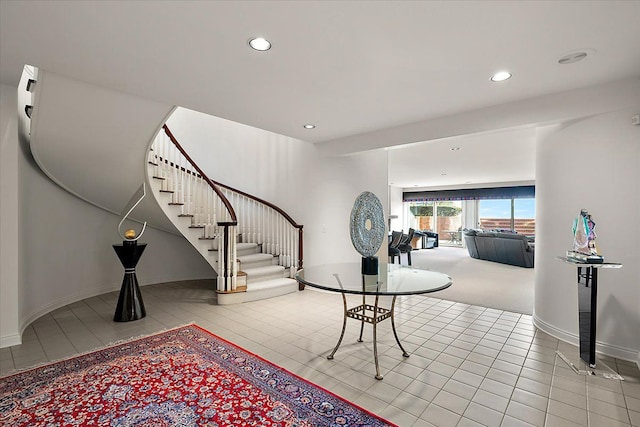 foyer with light tile patterned floors