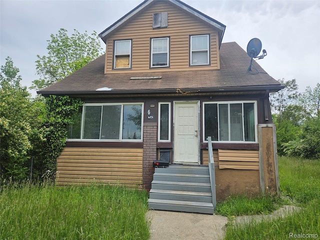 65 Portage St, Highland Park, MI 48203 - view of front facade with a shingled roof