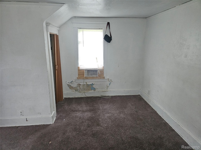 65 Portage St, Highland Park, MI 48203 - additional living space with carpet flooring, vaulted ceiling, baseboards, and cooling unit