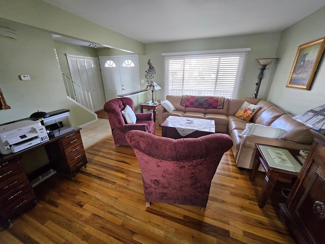 living room with dark hardwood / wood-style floors