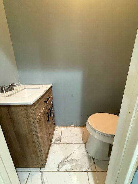 bathroom with vanity and toilet