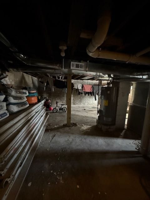 basement featuring water heater