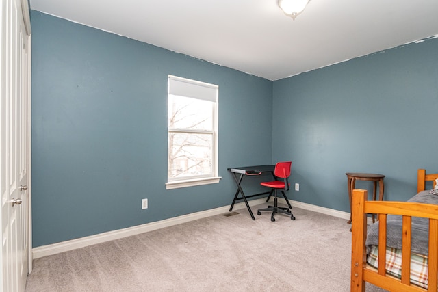 bedroom with light colored carpet