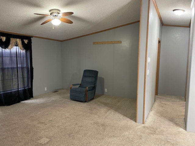 unfurnished room featuring crown molding, light colored carpet, and a textured ceiling