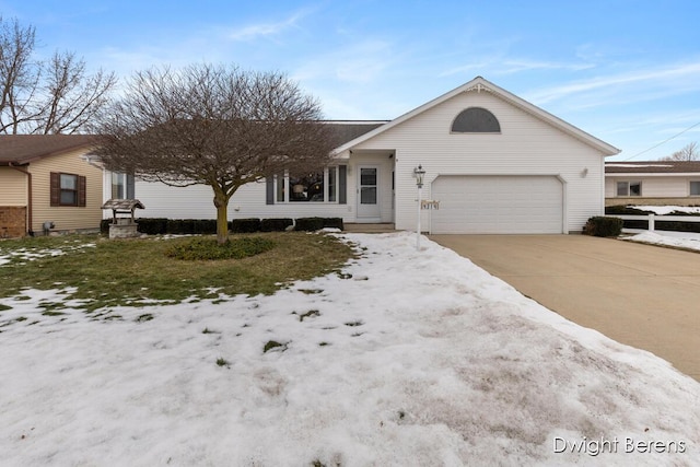 single story home featuring a garage