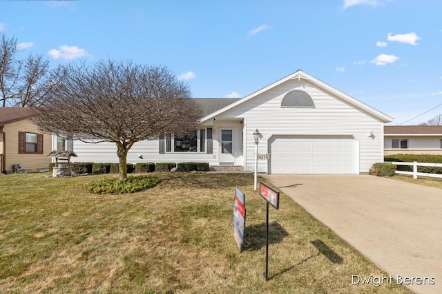 ranch-style home with a front yard, an attached garage, fence, and driveway