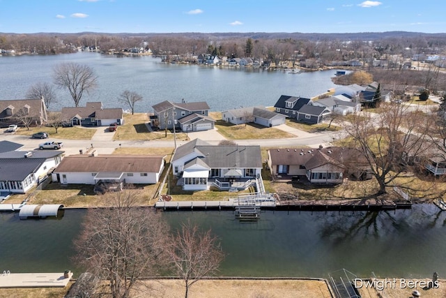 aerial view with a residential view and a water view