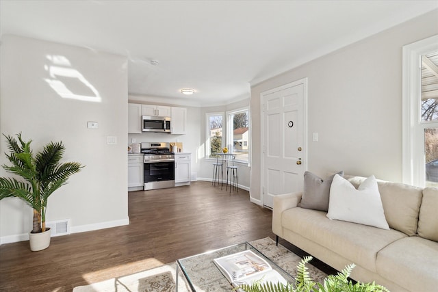 living room featuring dark wood-type flooring